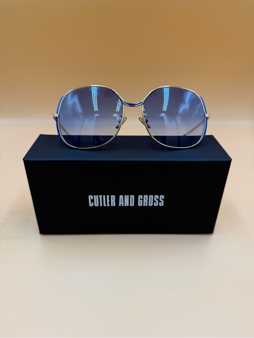Cutler and Gross Women's Gold Frame Sunglasses with Blue Gradient Lenses